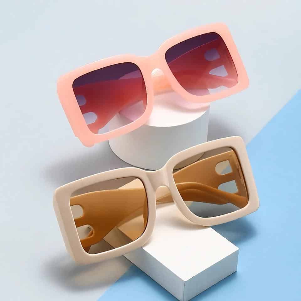 Stylish large square sunglasses with tinted lenses and colorful frames, perfect for summer and fashion accessories.