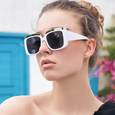 Stylish white and black sunglasses with UV protection, perfect for women to elevate their outdoor fashion look and protect eyes from harmful sun rays.