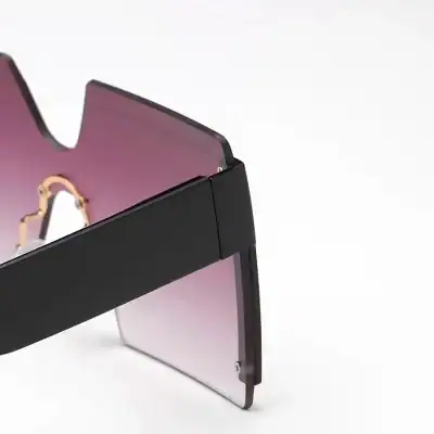Stylish black sunglasses display stand for marketing sunglasses at Monalisa Store, perfect for showcasing trendy eyewear collections.