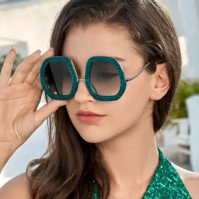 Stylish oversized sunglasses with green frames, UV protection, perfect for summer fashion, outdoor activities, and trendy accessories. Elegant, modern eyewear for women, enhancing your style.