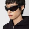 High-quality black sporty sunglasses, stylish and UV-protective, perfect for fashion and outdoor use.