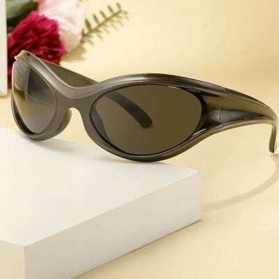 Stylish microwave sunglasses with wraparound design and tinted lenses for eye protection, perfect for outdoor fashion and sports activities.