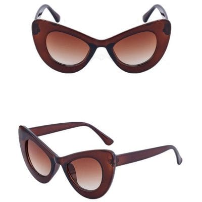 Stylish brown oversized sunglasses with gradient lenses, perfect for UV protection and fashion. Ideal for women seeking a trendy accessory from Monalisa Store.