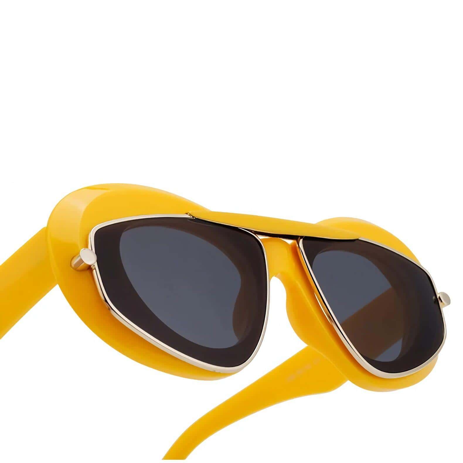 Stylish yellow sunglasses with black tint lenses, perfect for UV protection and trendy summer fashion. Suitable for women and men, made from durable materials for everyday wear.