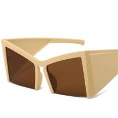 High-quality beige sunglasses with brown tinted lenses, stylish design perfect for sun protection and fashion-forward looks. Ideal for outdoor activities, fashion accessories, and UV protection.