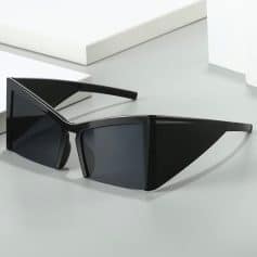 Bold black square sunglasses with tinted lenses for UV protection. Stylish and trendy eyewear perfect for fashion-forward individuals.