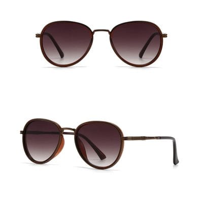 Elegant brown sunglasses with gradient tinted lenses and metal frame, perfect for eye protection and fashion. Suitable for women and men, ideal for outdoor wear and sunny days.