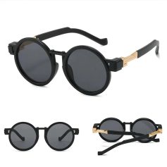 Stylish black round sunglasses featuring dark UV-protective lenses, durable black frames with gold accents, perfect for fashion-forward individuals seeking eye protection and a chic look.