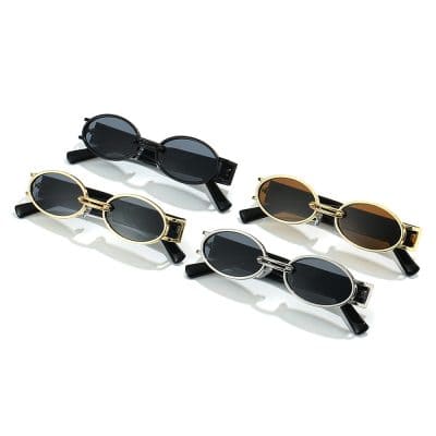 Stylish oval-shaped sunglasses with black, gold, and silver frames, ideal for sunglasses shopping and eye protection. Bright, trendy accessories perfect for summer fashion.