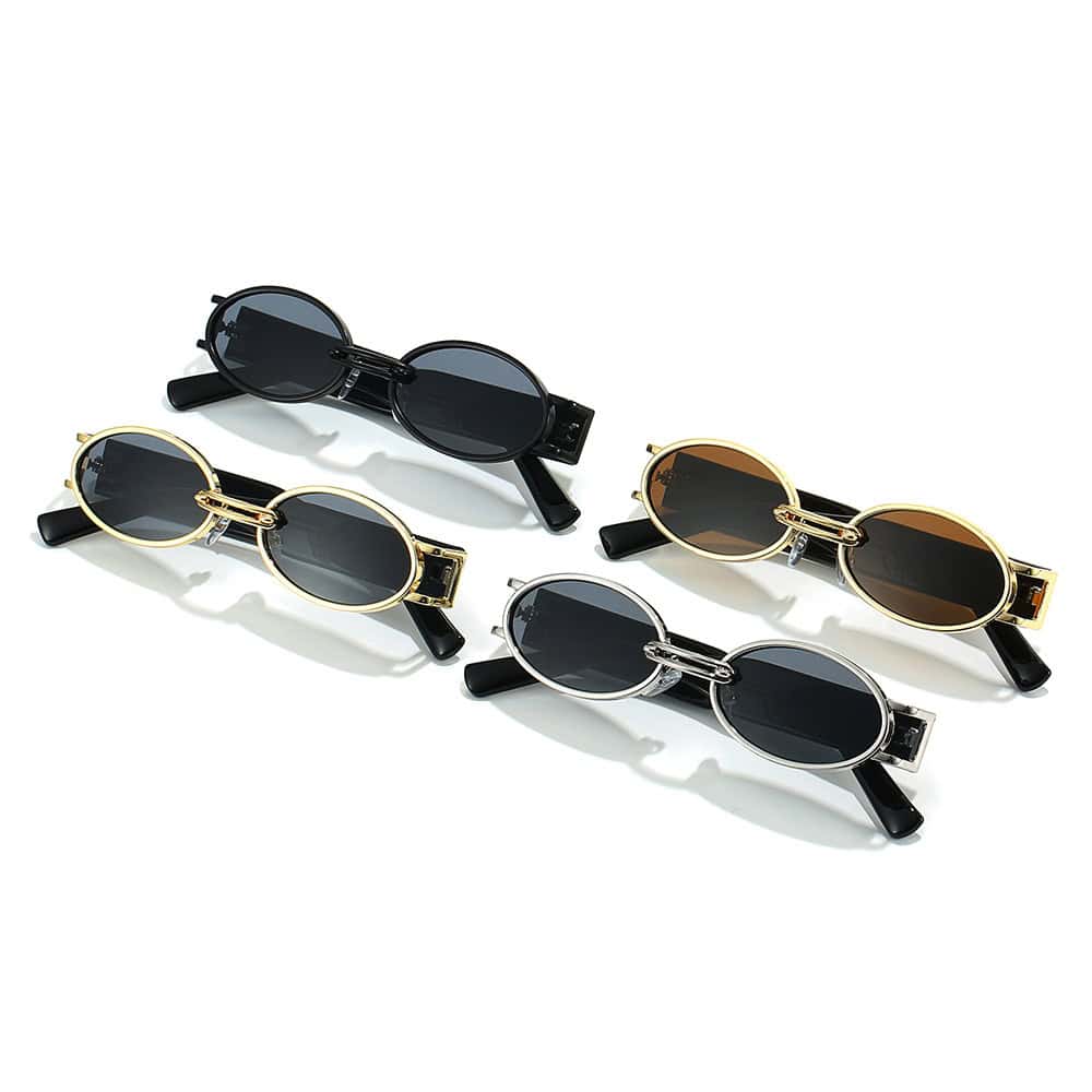 Stylish oval-shaped sunglasses with black, gold, and silver frames, ideal for sunglasses shopping and eye protection. Bright, trendy accessories perfect for summer fashion.