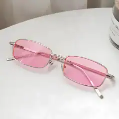 Pink-tinted rectangular sunglasses with metal frame for fashionable eye protection and UV blocking. Perfect for outdoor activities and enhancing your trendy look.