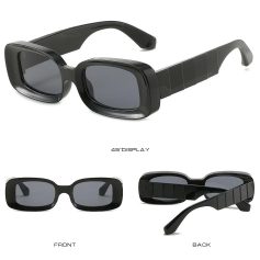 Stylish black vintage sunglasses with polarized lenses and wide frame, perfect for fashion-forward eyewear needs.