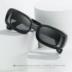 Stylish black safety glasses with tinted lenses designed for digital device users, ideal for protecting eyes from blue light and screen glare in modern office or home environments.