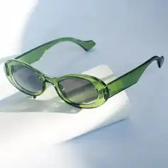 Bright green sunglasses with dark lenses, perfect for summer fashion and UV protection, featuring a trendy oversized design suitable for both women and men.