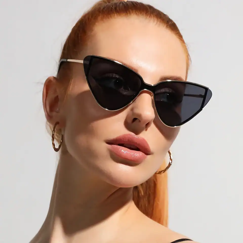 Stylish black cat-eye sunglasses for women with UV protection, perfect for fashion-forward eyewear lovers. Shop high-quality optical accessories at Monalisa Store.