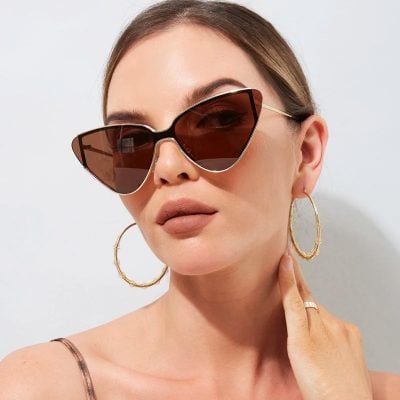 Stylish cat-eye sunglasses for women, UV protection, trendy eyewear from Monalisa Store. Perfect for summer fashion and eye health.