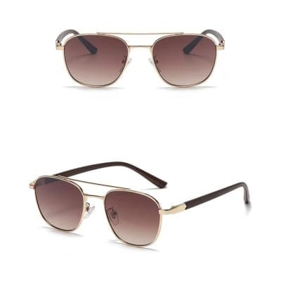 Stylish sunglasses with gold frames and gradient lenses, perfect for sun protection and fashion. Ideal for women and men seeking luxury eye accessories.