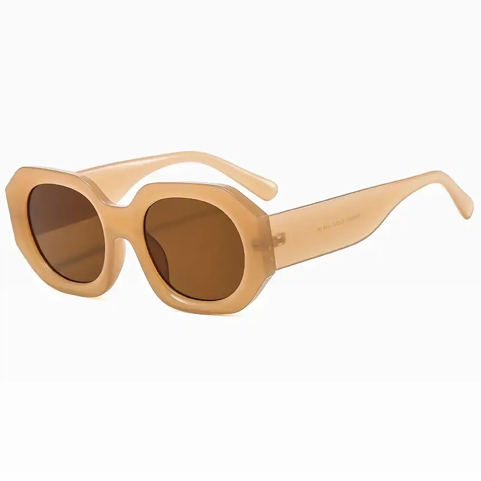 Stylish beige plastic sunglasses with tinted lenses, ideal for sun protection and fashionable accessories. Perfect for outdoor wear and enhancing your summer look.