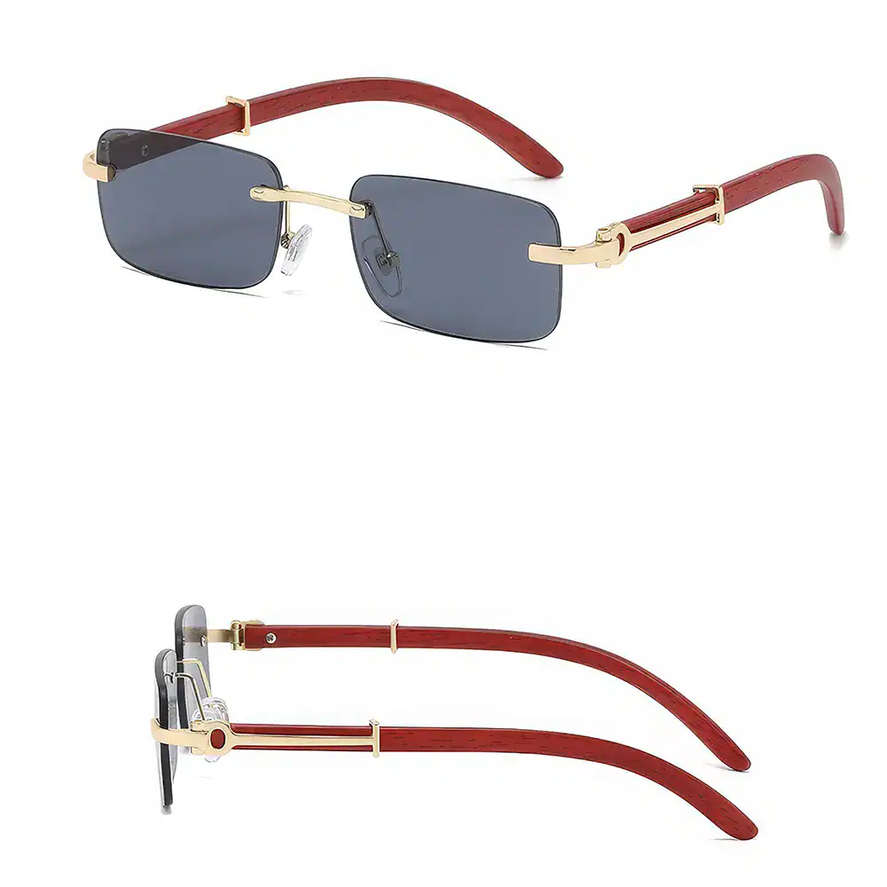 Elegant designer sunglasses with dark lenses, gold accents, and red temples, perfect for stylish sun protection.