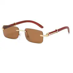 Stylish designer sunglasses featuring brown tinted lenses, gold accents, and contemporary frame design for fashionable eye protection. Perfect for summer and outdoor activities.