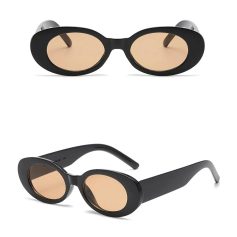 Stylish black oval sunglasses for men and women with UV protection. Perfect for fashion-forward eyewear and sun protection.