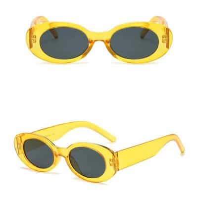 Fashionable yellow oval sunglasses with dark lenses, perfect for UV protection and enhancing your outdoor look.