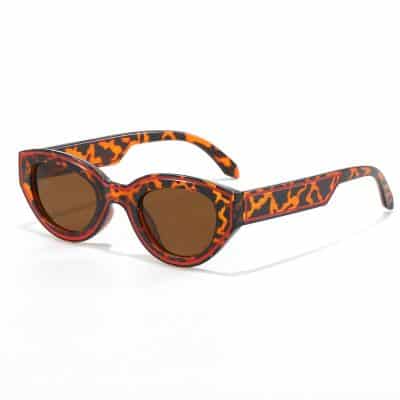 Stylish tortoise shell sunglasses with brown UV-protected lenses, perfect for fashionable eye protection and outdoor activities.