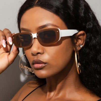 Stylish sunglasses model focusing on monitor eye protection and fashion accessories. Perfect for enhancing your style with high-quality eyewear at Monalisa Medical Store.