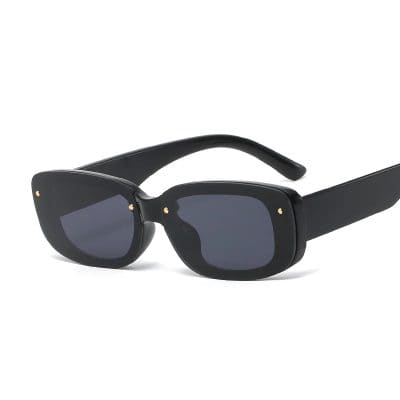Stylish black sunglasses with dark lenses, perfect for sun protection and fashion statements. Features durable frame and classic design suitable for outdoor activities and casual wear.