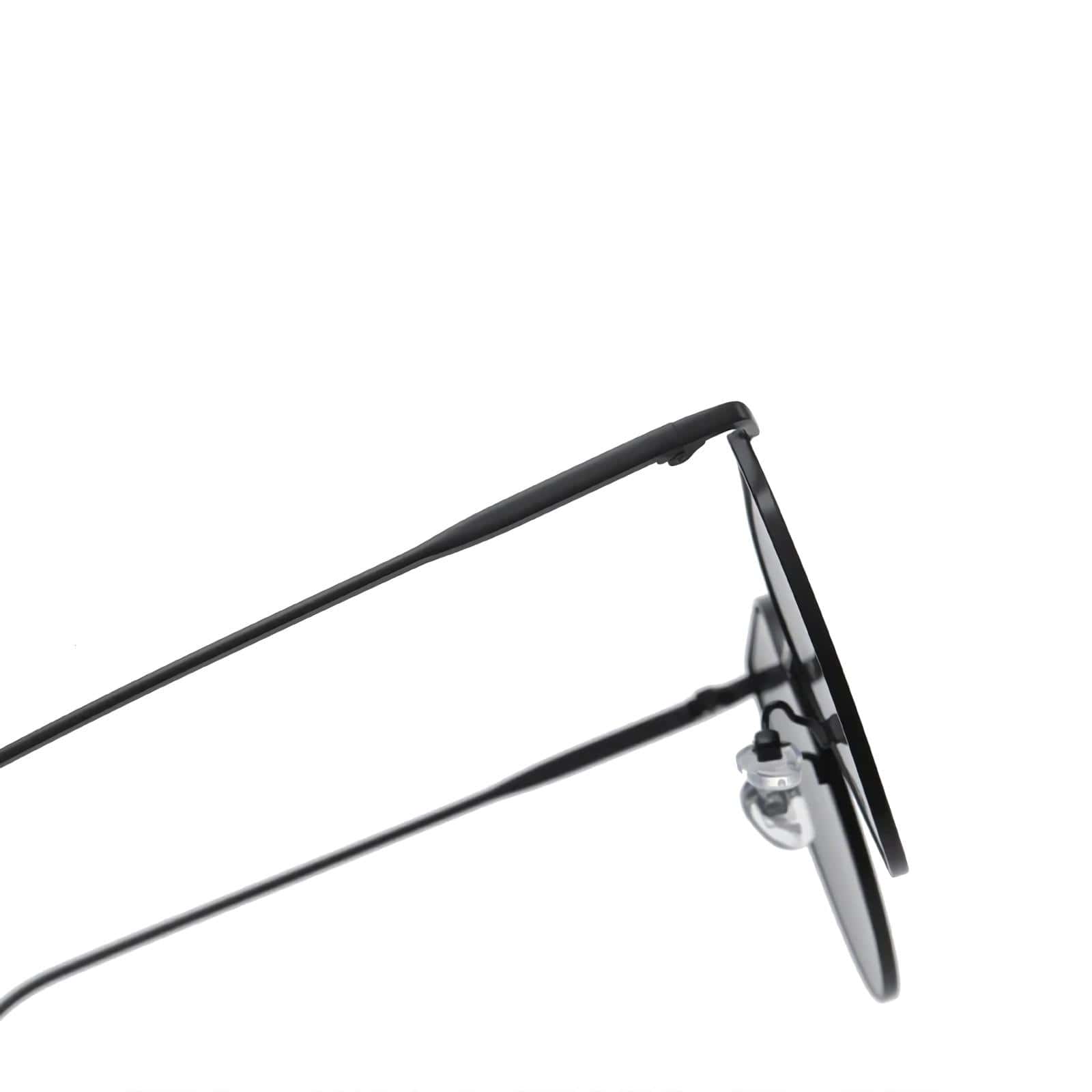 High-quality black eyeglasses with thin metal temples and round lenses, perfect for fashion-forward individuals seeking comfort and durability in optical eyewear.