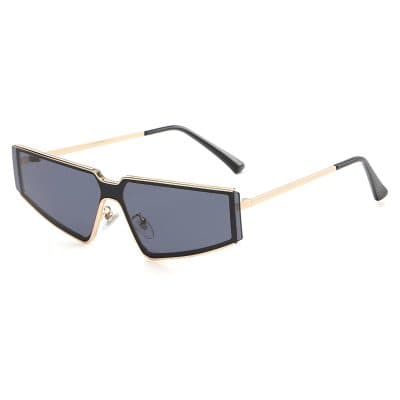 Stylish black and gold oversized sunglasses with dark tinted lenses, perfect for outdoor sun protection and enhancing your fashion statement.
