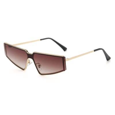 Stylish oversized sunglasses with gradient lenses, gold accents, and black temple tips for a fashionable eye protection. Perfect for outdoor wear and sun protection.