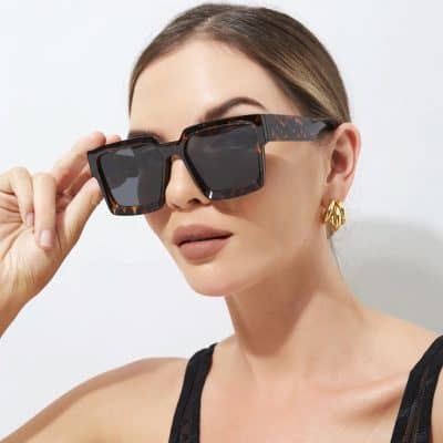 Stylish oversized tortoise shell sunglasses for women, UV protection, and trendy accessory for summer and outdoor wear.