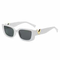 Stylish white sunglasses featuring dark lenses and elegant gold V-shaped details on the temples, perfect for fashion-forward eye protection.