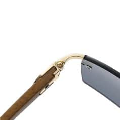 High-end designer sunglasses with a metal and acetate construction, featuring adjustable nose pads and sleek modern design, perfect for fashion-forward individuals.