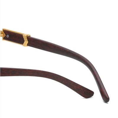 Stylish eyeglass temple with dark wood finish and gold accent, perfect for prescription glasses or sunglasses. Durable, lightweight, and fashionable for optometry and optical accessories.