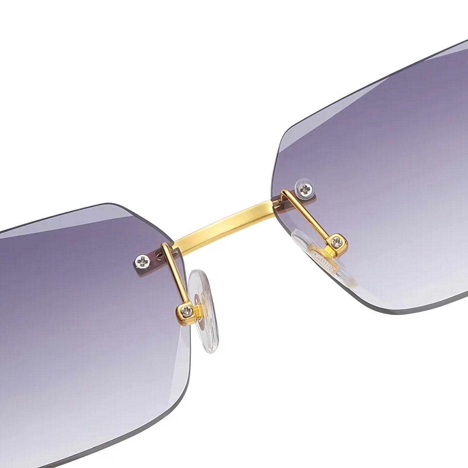 Close-up of sunglasses featuring gradient purple lenses, gold nose bridge and hinges, with adjustable nose pads for a comfortable fit.