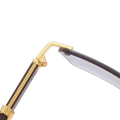 Elegant black and gold prescription glasses with adjustable arm hinges, offering comfort and durability. Ideal for both men and women seeking fashionable eye accessories from Monalisa Store.