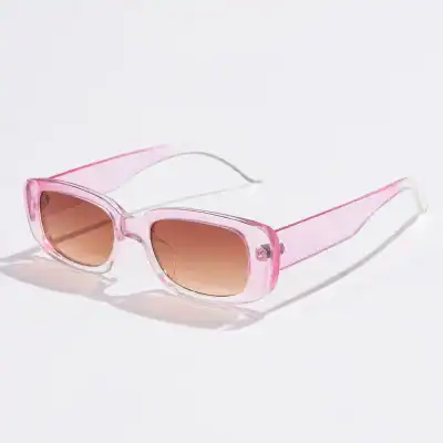 Pink sunglasses with gradient lenses, stylish design, UV protection, perfect for summer and outdoor activities. Trendy eyewear for women seeking sun protection and fashion.