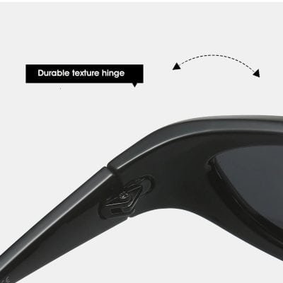 Close-up image of black sunglasses highlighting a durable textured hinge for improved longevity and style.
