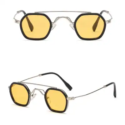 High-quality fashion sunglasses with yellow-tinted lenses and sleek black frames, perfect for UV protection and modern eyewear fashion.