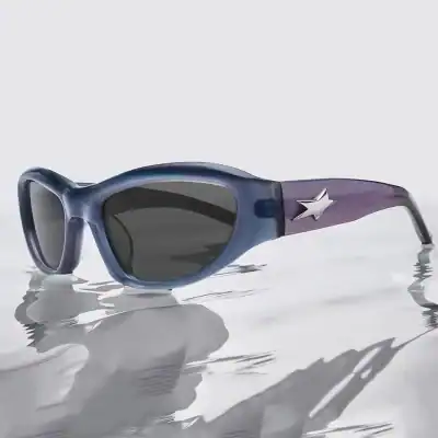 Stylish blue sunglasses with star detail for UV protection and fashion. Perfect for outdoor activities, providing eye protection and enhancing your fashion statement.