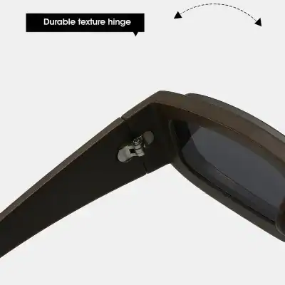 A close-up of black sunglasses showcasing a durable textured hinge with a sturdy design, emphasizing style and longevity, perfect for those seeking fashionable and durable eye protection.