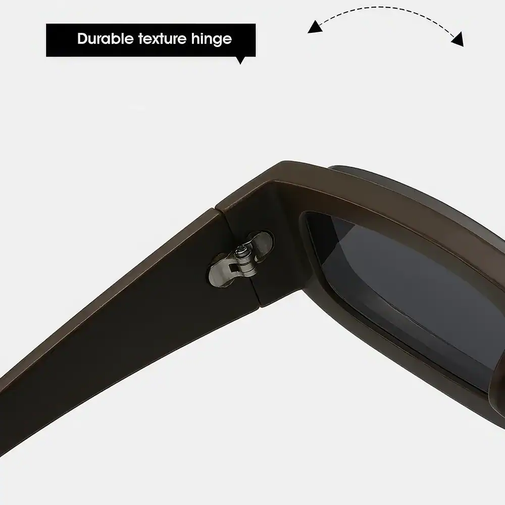 A close-up of black sunglasses showcasing a durable textured hinge with a sturdy design, emphasizing style and longevity, perfect for those seeking fashionable and durable eye protection.
