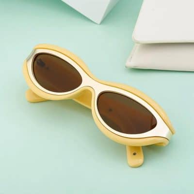 Stylish sunglasses with a unique frame design, perfect for eye protection and fashion. Available at Monalisa Store for trendy eye care accessories.