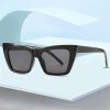 Stylish black sunglasses with UV protection lenses for eye safety and fashion. Perfect for outdoor activities and sun exposure.