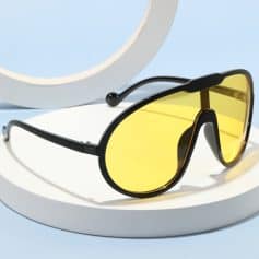 Stylish sunglasses with yellow tinted lenses, perfect for sun protection and fashion. Explore the Monalisa Store for premium eyewear options and accessories.