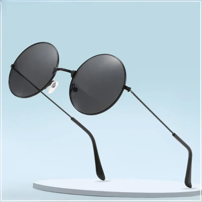 Stylish black round sunglasses with UV protection, lightweight frame, ideal for fashion-forward individuals and eyewear accessories at Monalisa Store.