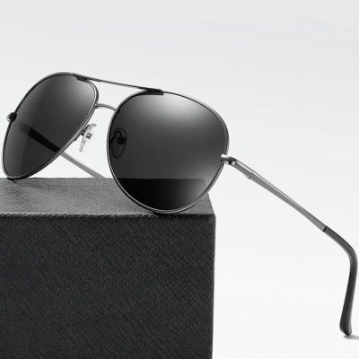 Stylish black aviator sunglasses with reflective lenses for men and women. Perfect for summer fashion and eye protection.