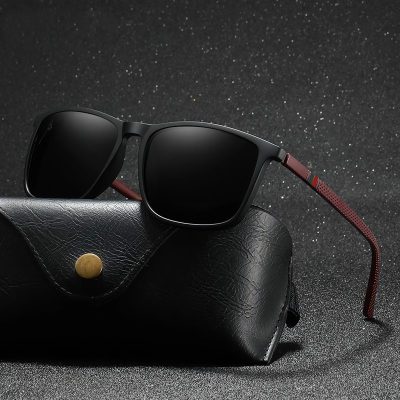 Stylish black sunglasses with dark lenses by Monalisa Store, perfect for UV protection and fashion-forward eyewear.